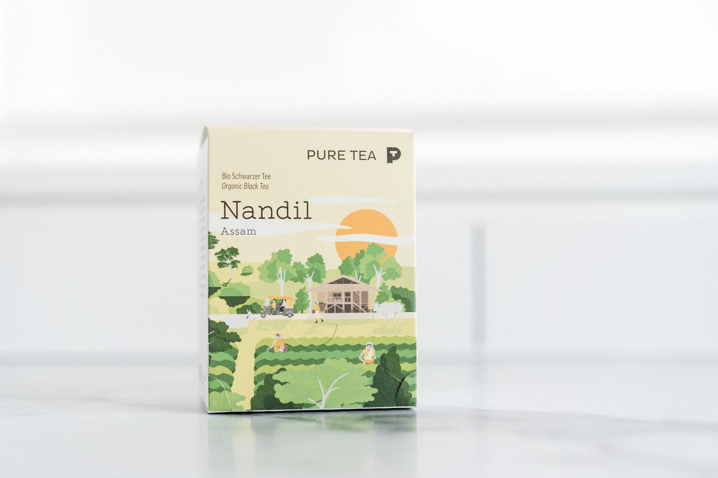 nandil Assam 15 pk på kjøkkenbenk